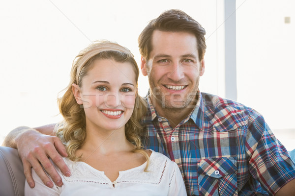 Loving couple looking at the camera Stock photo © wavebreak_media