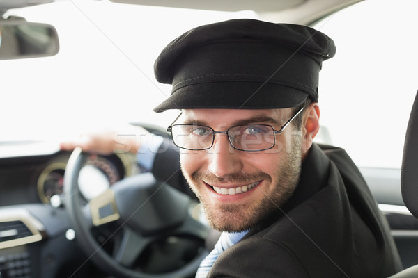 élégant chauffeur souriant caméra voiture costume [[stock_photo]] © wavebreak_media