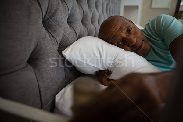Сток-фото: портрет · старший · человека · расслабляющая · кровать · домой