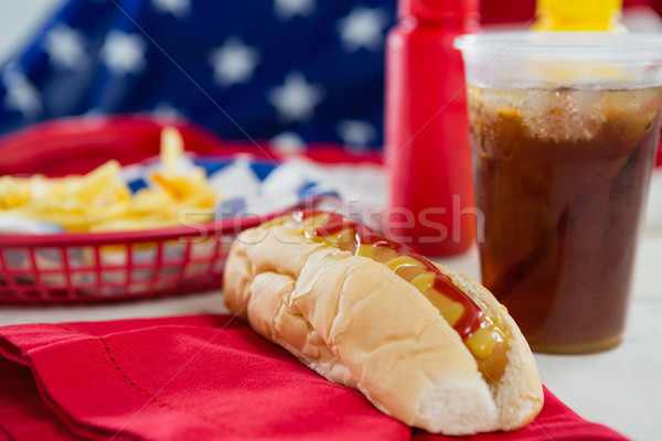 American flag and hot dog on wooden table Stock photo © wavebreak_media