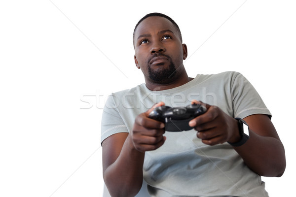 Homme jouer jeu vidéo blanche technologie [[stock_photo]] © wavebreak_media