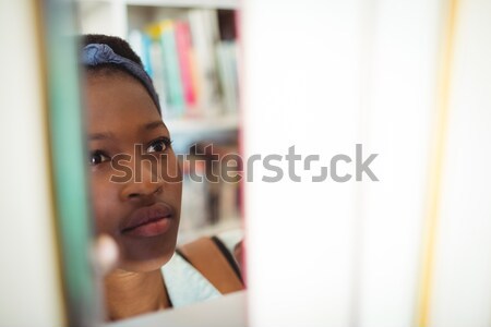 Kadın dudak parlatıcısı ayna genç kadın ev Stok fotoğraf © wavebreak_media