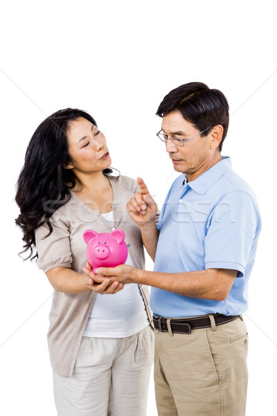 Foto stock: Feliz · casal · piggy · bank · mãos · fundo