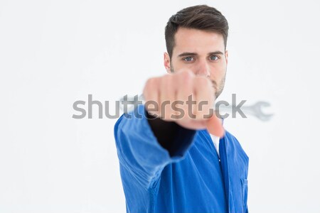 Male nurse touching an invisible screen Stock photo © wavebreak_media