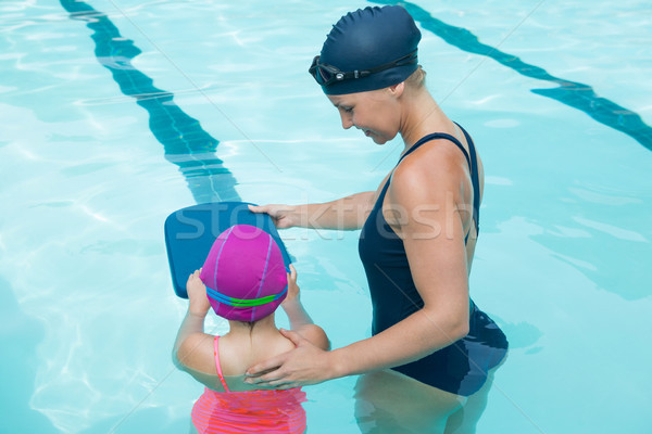 Kobiet instruktor szkolenia młoda dziewczyna basen kobieta Zdjęcia stock © wavebreak_media