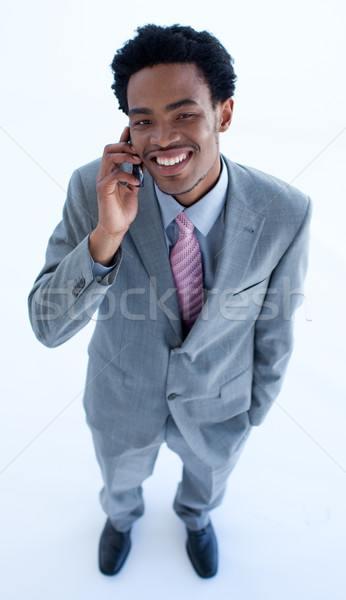 Zdjęcia stock: Uśmiechnięty · biznesmen · telefonu · komórkowego · biuro
