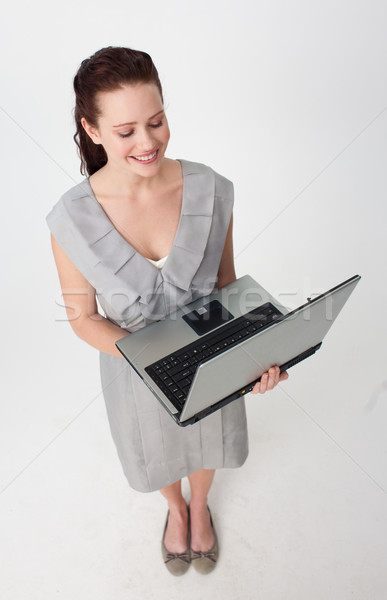 Mooie zakenvrouw met behulp van laptop glimlachend computer Stockfoto © wavebreak_media