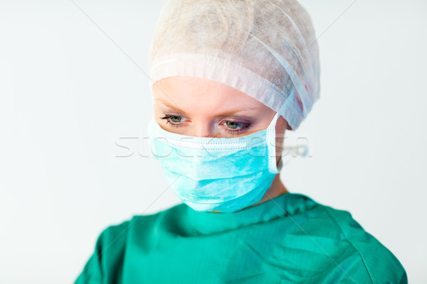 Bastante femenino cirujano máscara cara médico Foto stock © wavebreak_media