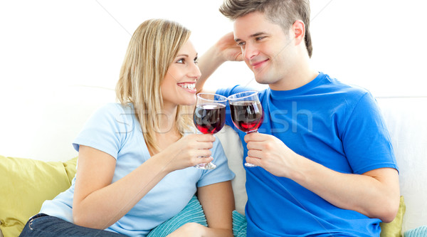 Stock photo: Charming couple drinking wine together 