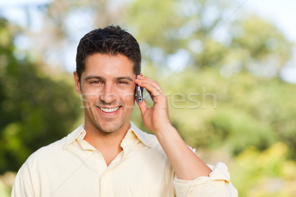Man phoning in the park Stock photo © wavebreak_media
