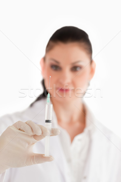 Medic seringă alb femeie mână fericit Imagine de stoc © wavebreak_media