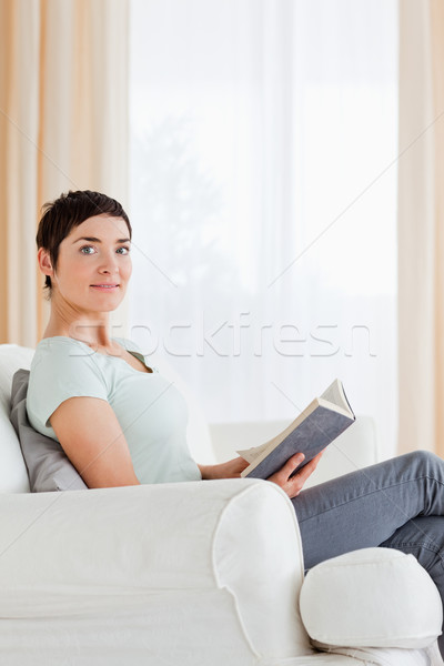 Portrait of a short-haired woman holding a book  Stock photo © wavebreak_media