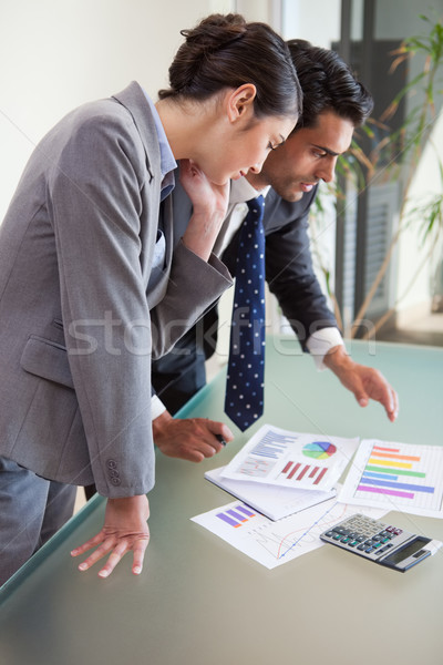 Portrait of young sales persons studying their results in an office Stock photo © wavebreak_media