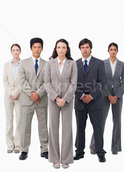 Tradeswoman standing with her team against a white background Stock photo © wavebreak_media
