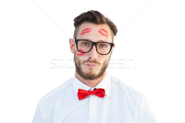 Geeky hipster with kisses on his face Stock photo © wavebreak_media