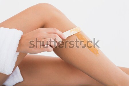 Widok z boku kobiet hot wosk nogi Zdjęcia stock © wavebreak_media