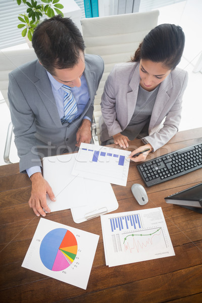 Businesswoman working with team mate Stock photo © wavebreak_media