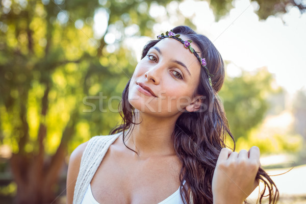 Pretty hipster smiling in the park Stock photo © wavebreak_media
