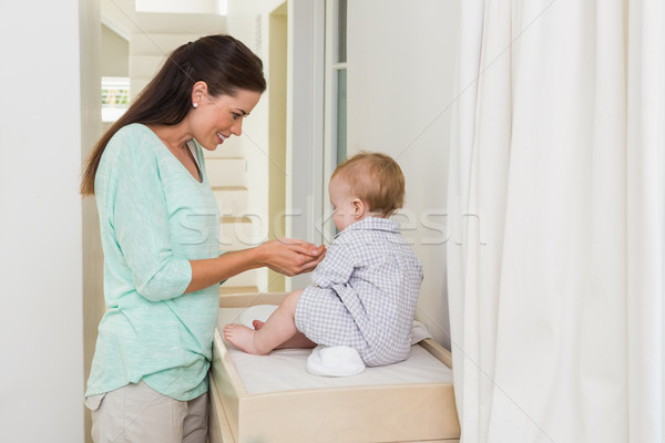 Happy mother with her baby boy Stock photo © wavebreak_media