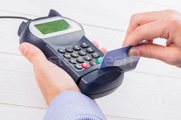 [[stock_photo]]: Homme · carte · de · crédit · table · en · bois · Shopping · Finance · broches