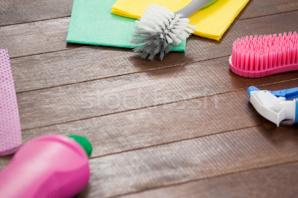 Cleaning equipments arranged on wooden floor Stock photo © wavebreak_media