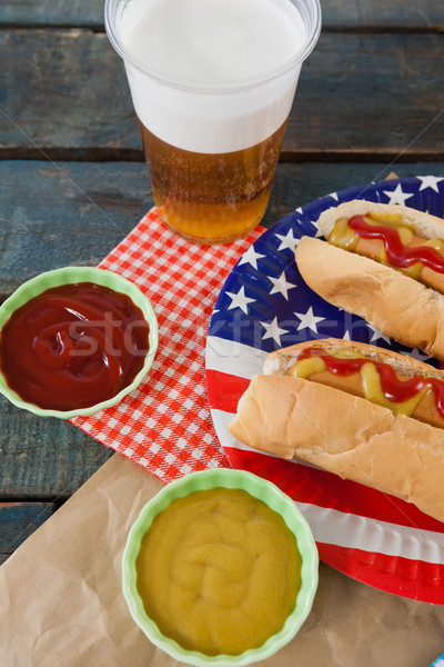 Hot dog served on plate with french fries Stock photo © wavebreak_media