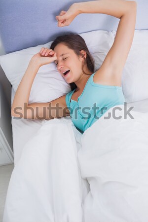 Menina adormecido cama casa casa Foto stock © wavebreak_media
