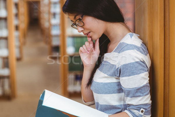 [[stock_photo]]: étudiant · étagères · lecture · livre