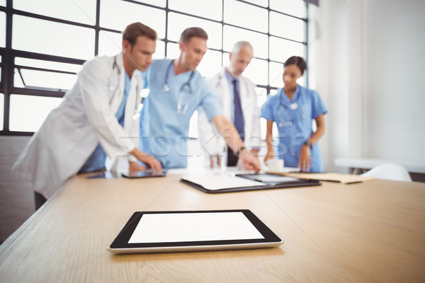 Digital tablet on table in conference room Stock photo © wavebreak_media