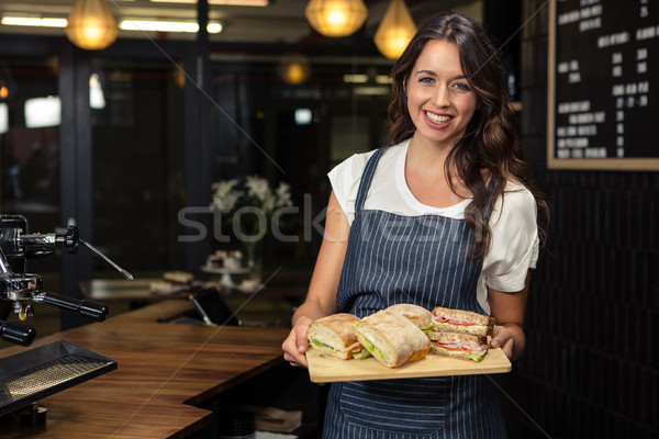 笑みを浮かべて バリスタ プレート サンドイッチ コーヒーショップ ストックフォト © wavebreak_media