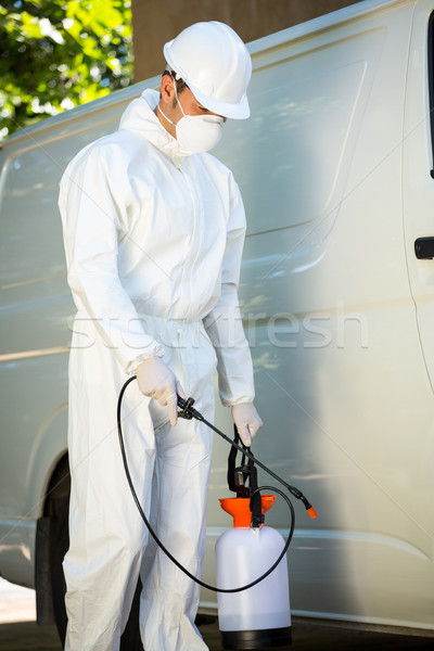 Portrait of pest control man standing next to a van Stock photo © wavebreak_media
