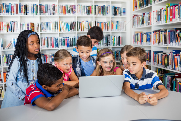 Vue élèves étudier portable bibliothèque [[stock_photo]] © wavebreak_media