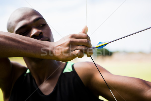 Atlet tragere cu arcul stadion sport negru Imagine de stoc © wavebreak_media