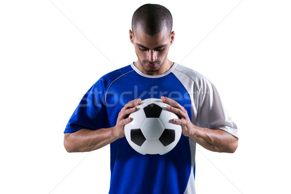 Football player holding football with both hands Stock photo © wavebreak_media