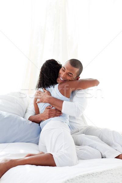 Romantic couple hugging on their bed  Stock photo © wavebreak_media