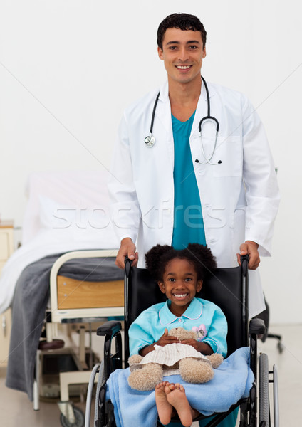 Doctor helping a sick child Stock photo © wavebreak_media