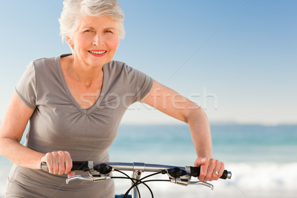 Senior woman with her bike Stock photo © wavebreak_media