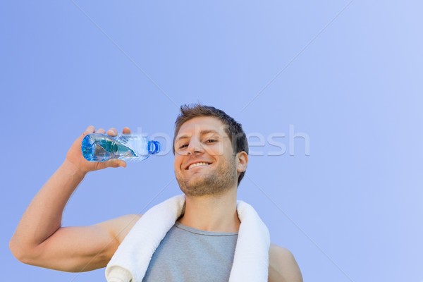 Man drinking water after the gym Stock photo © wavebreak_media