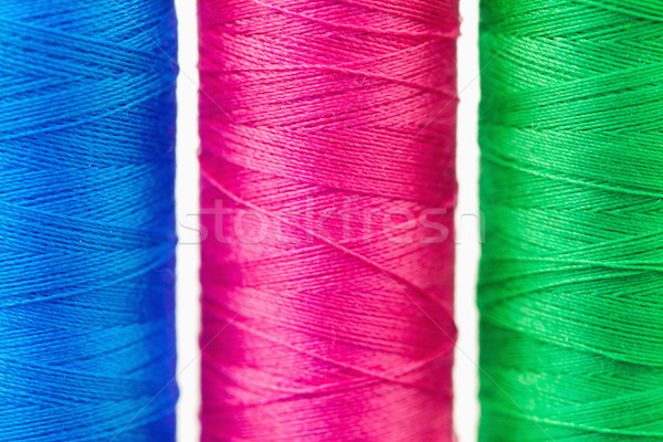 Colorful spools of thread against a white background Stock photo © wavebreak_media