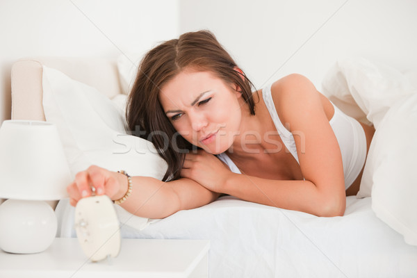 Cute woman waking up in her bedroom Stock photo © wavebreak_media