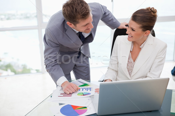 Business team analyzing poll results together Stock photo © wavebreak_media