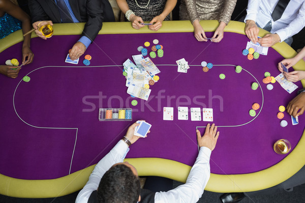 Foto d'archivio: Persone · seduta · tavola · casino · giocare · poker