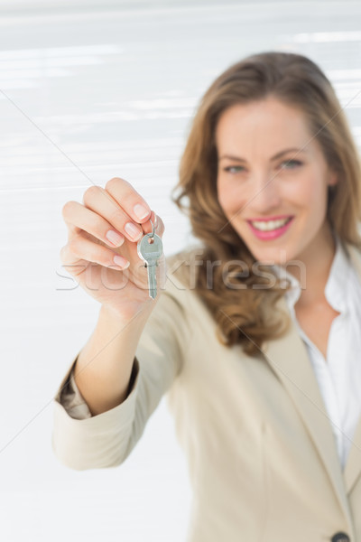 Portrait of a beautiful woman holding house keys Stock photo © wavebreak_media