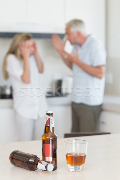 Stock photo: Angry couple arguing after drinking alcohol 