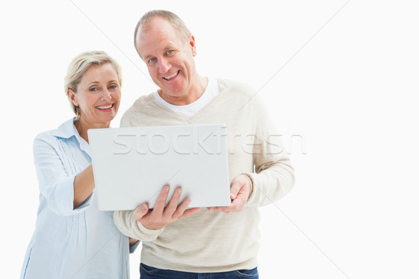 Feliz maduro casal usando laptop branco computador Foto stock © wavebreak_media