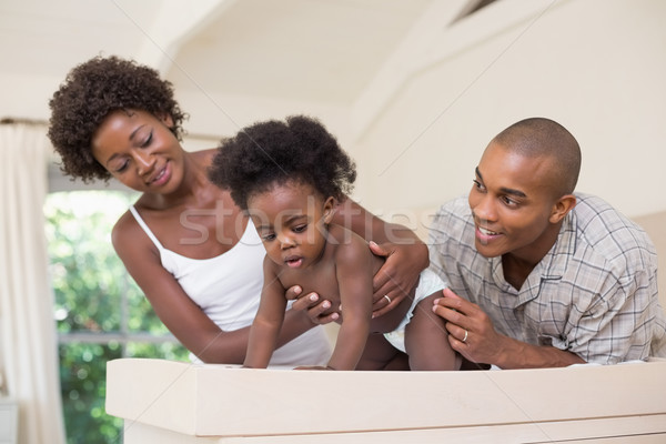 Happy parents with their baby girl  Stock photo © wavebreak_media