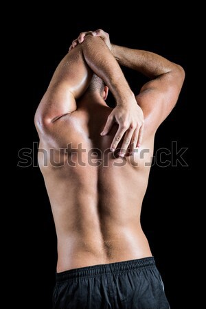 Rückansicht shirtless muskuläre Mann stehen schwarz Stock foto © wavebreak_media