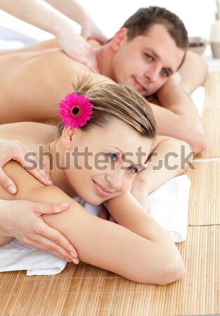 Stock photo: Woman receiving back massage at spa center