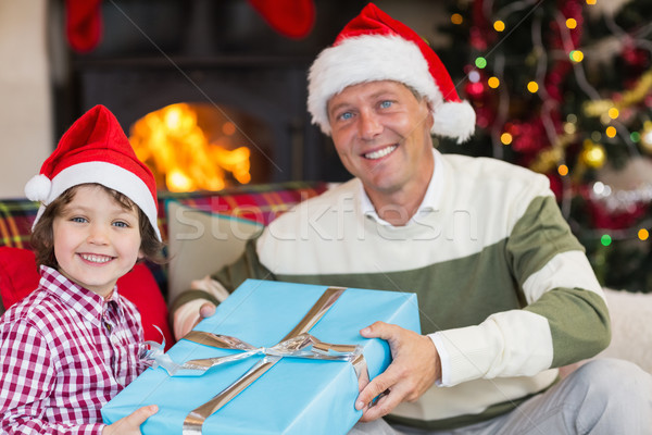 Stock fotó: Fiú · apa · karácsony · ajándék · kanapé · otthon
