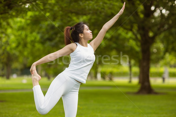 Toned woman doing stretching exercises in park Stock photo © wavebreak_media